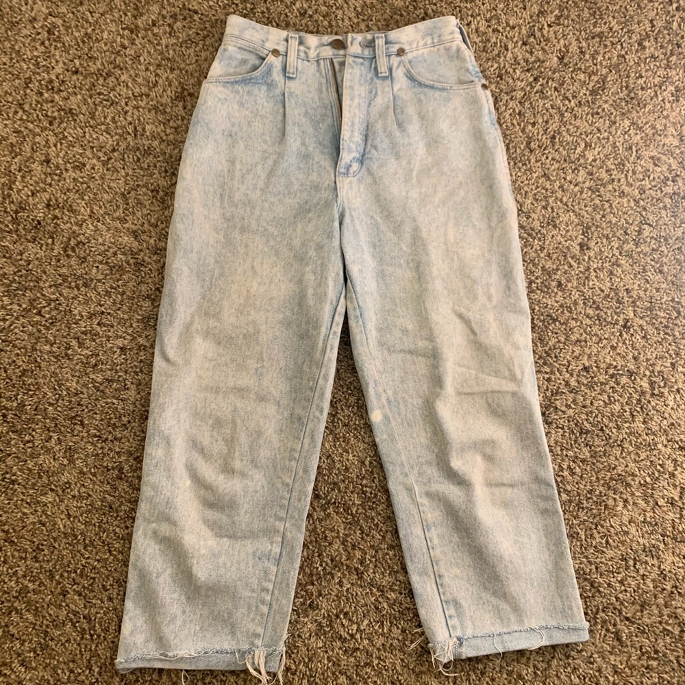 Vintage light wash wranglers